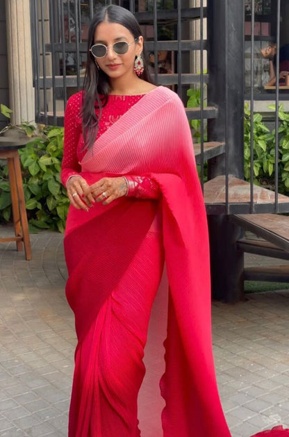 Multi shade red georgette pleated saree with heavy blouse