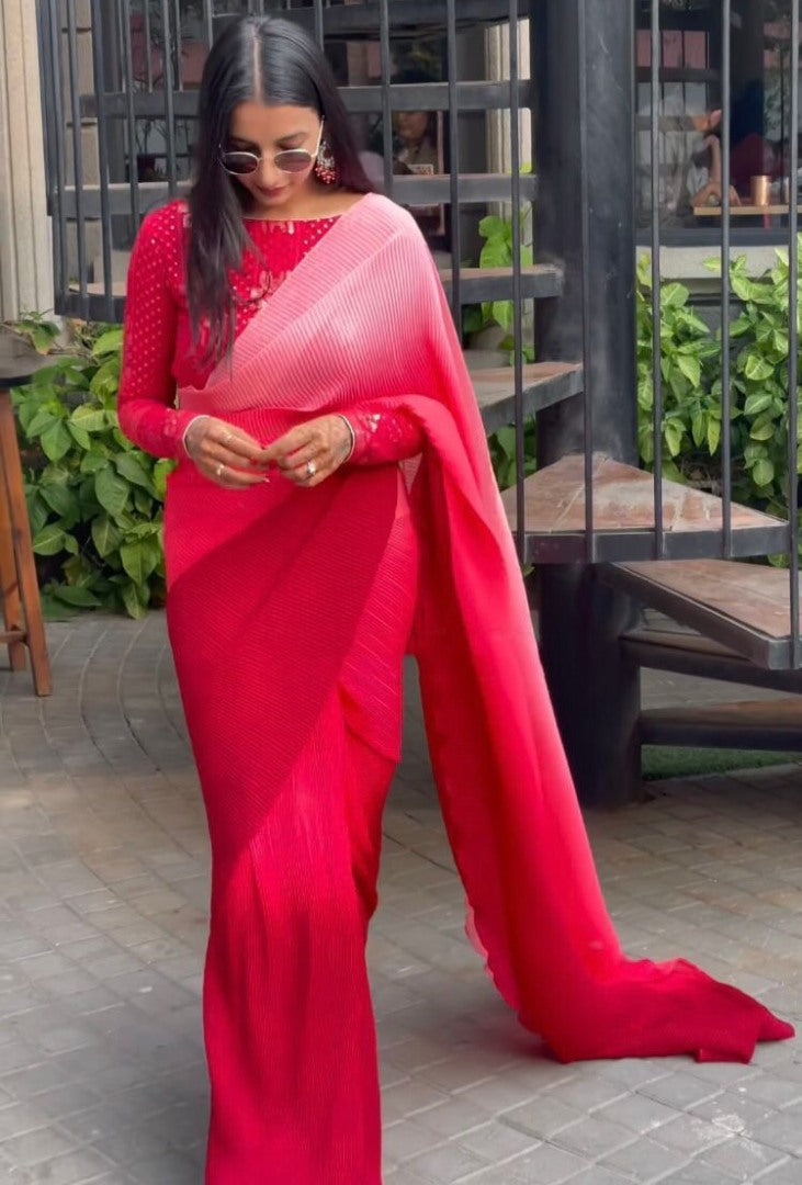Multi shade red georgette pleated saree with heavy blouse