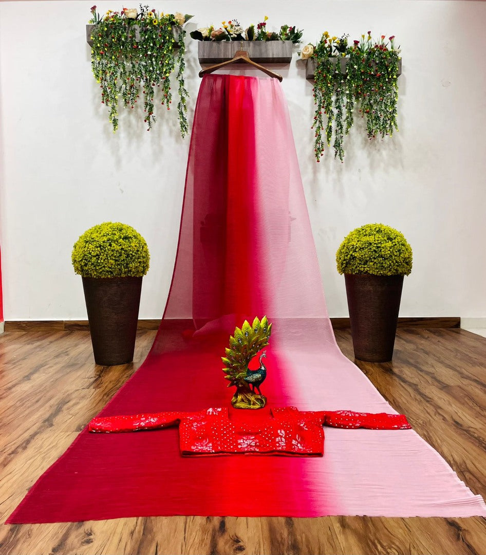 Multi shade red georgette pleated saree with heavy blouse