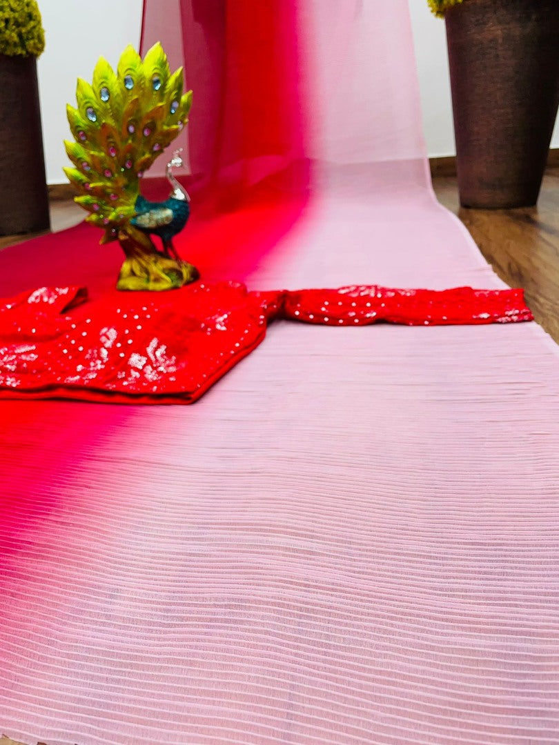 Multi shade red georgette pleated saree with heavy blouse