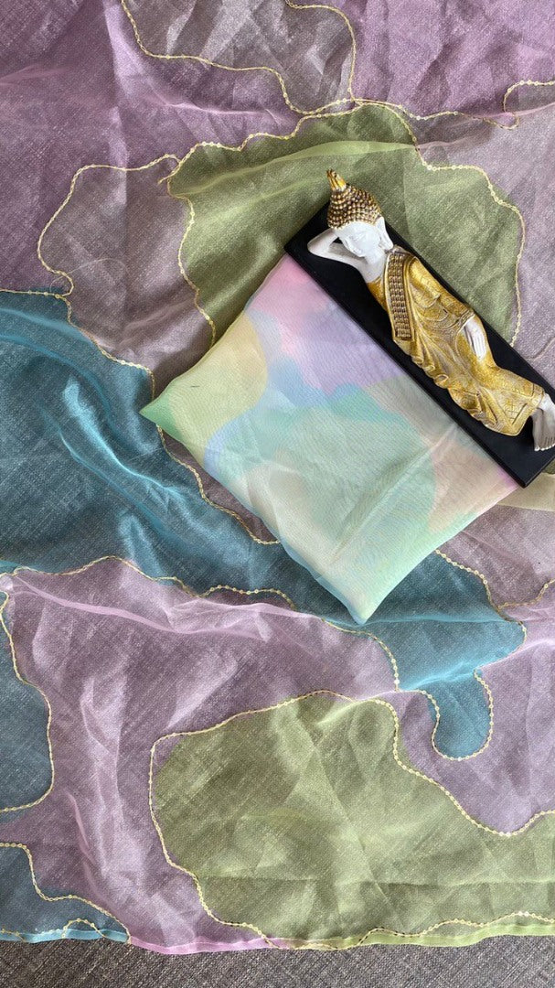 Multicolor organza print and sequence embroidered saree