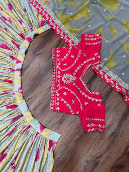 Multicolor tapeta silk print and embroidery work wedding lehenga choli