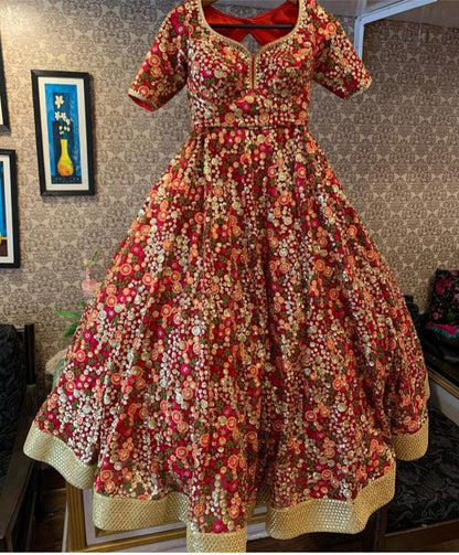 Multicolored thread embroidered net sequence work wedding lehenga choli