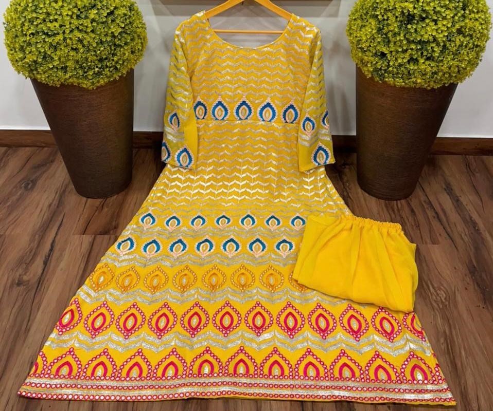 Mustard yellow georgette embroidered top with plazzo