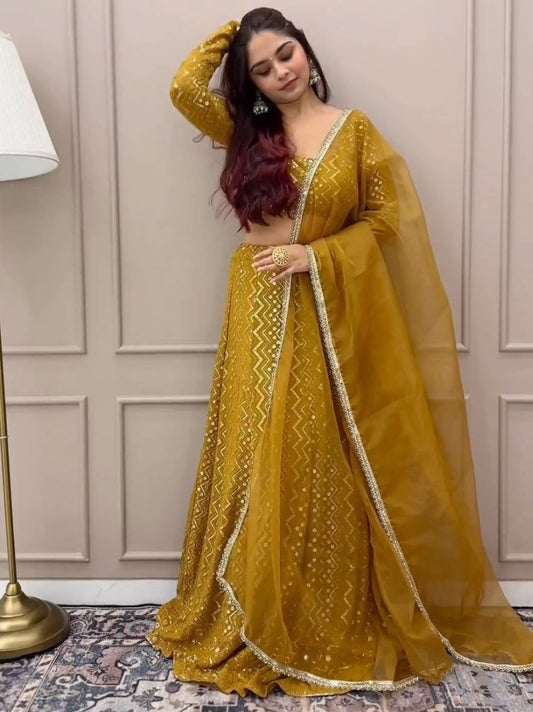 Musturd yellow georgette heavy thread sequence work lehenga choli for ceremony