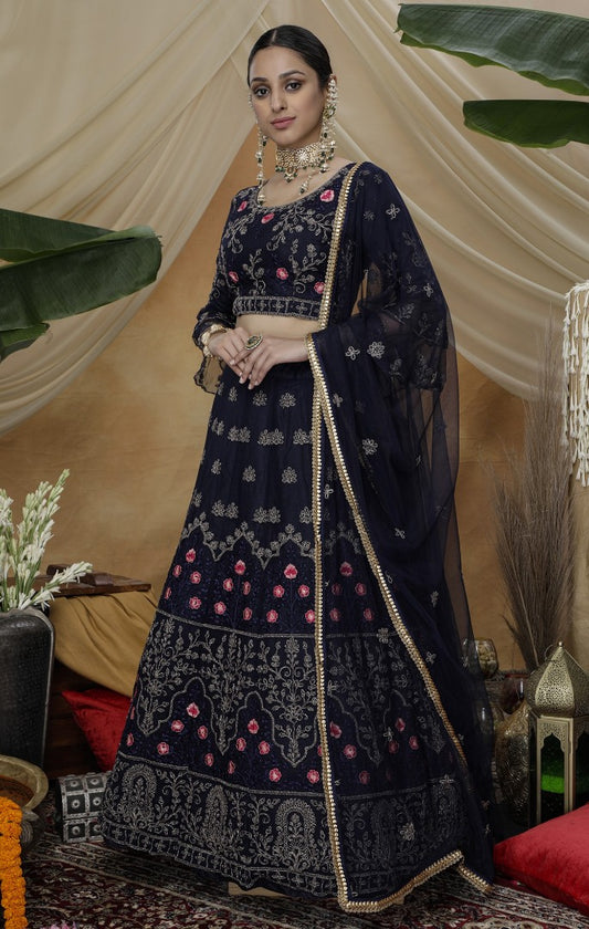Navy net heavy sequence embroidered wedding lehenga choli