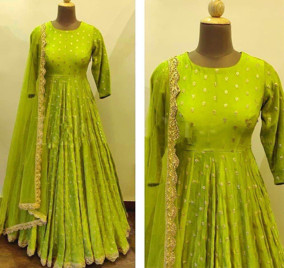 Neon green heavy georgette with embroidered work party wear gown