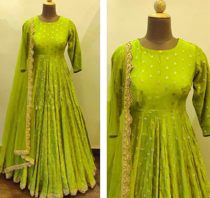 Neon green heavy georgette with embroidered work party wear gown