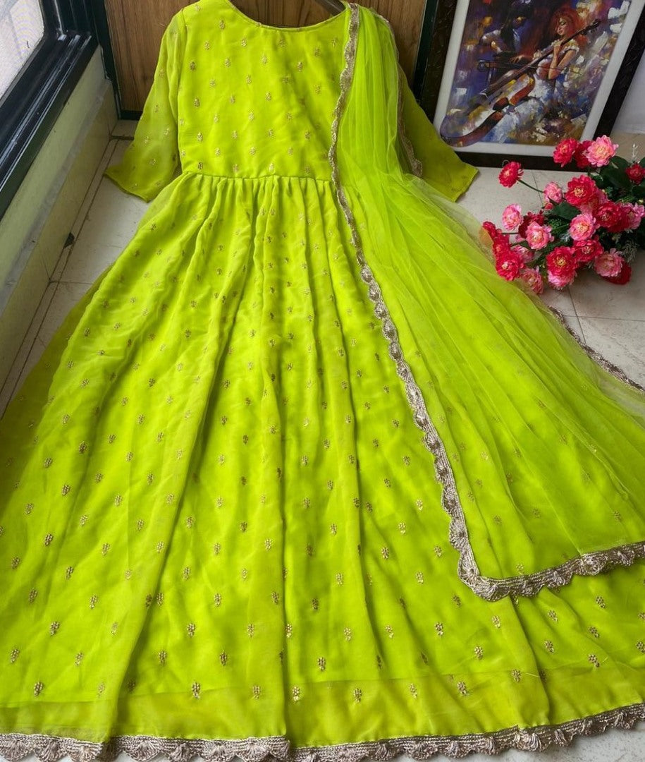 Neon green heavy georgette with embroidered work party wear gown