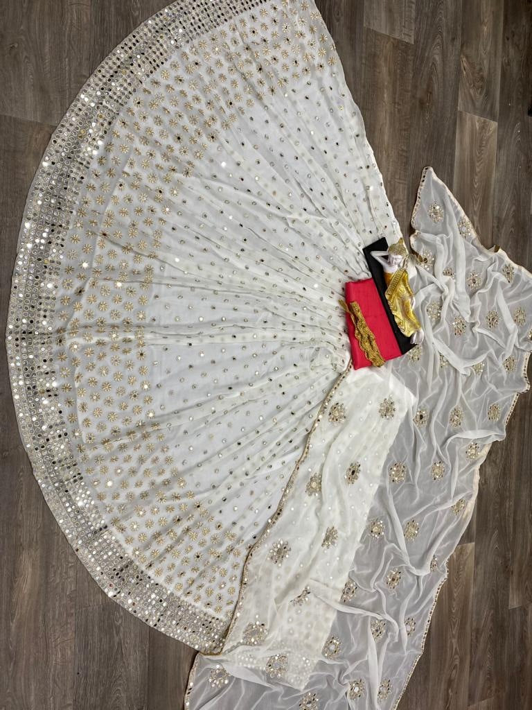 Off white georgette embroidered with real mirror work lehenga choli