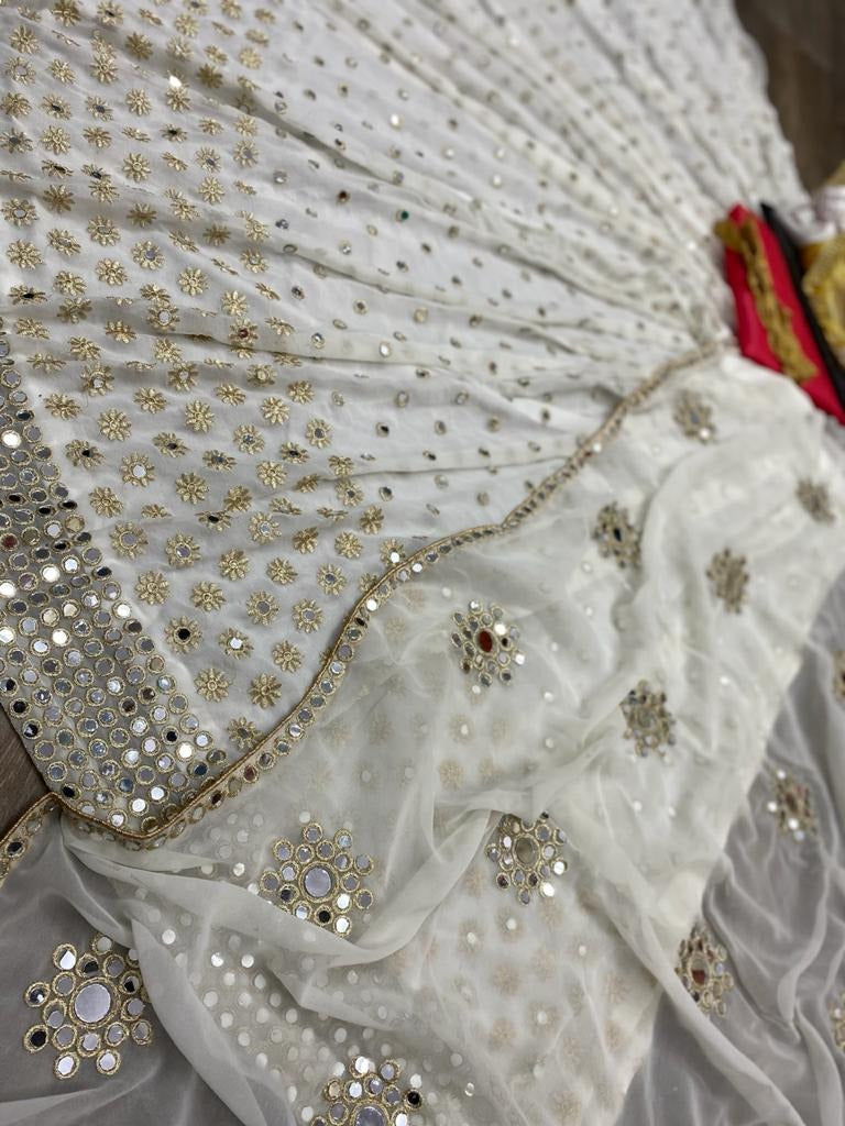 Off white georgette embroidered with real mirror work lehenga choli