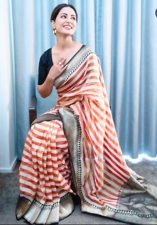 Orange and white stripe printed saree