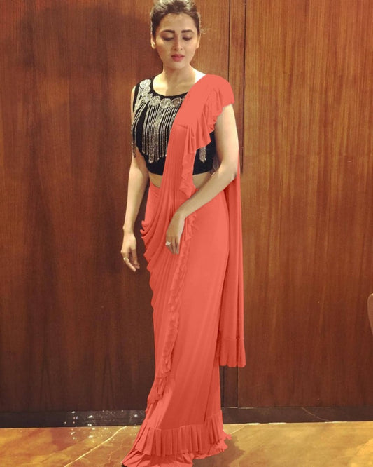 Orange crepe silk designer ruffle saree with handwork blouse