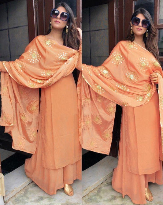 Orange faux georgette plazzo suit