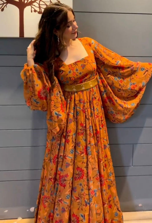 Orange georgette flower printed balloon sleeves festival wear gown