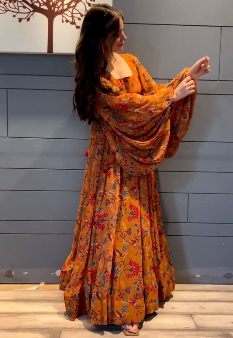 Orange georgette flower printed balloon sleeves festival wear gown