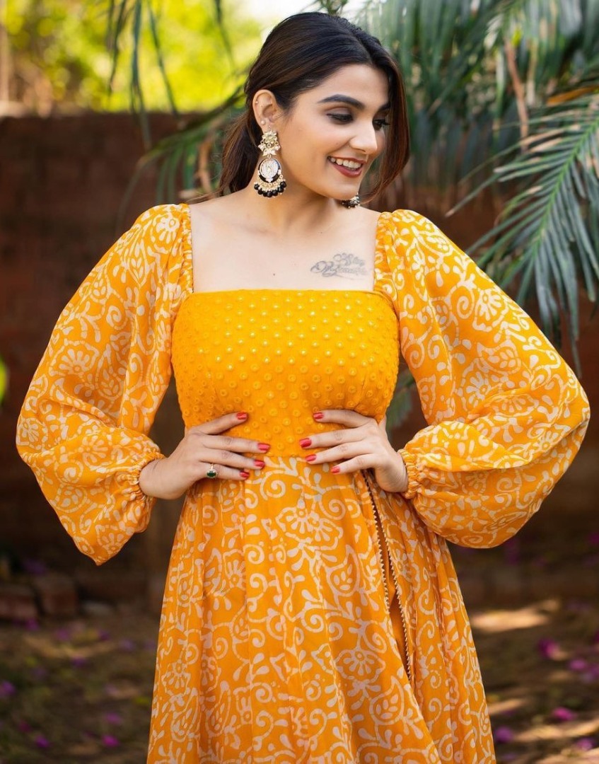Orange georgette print and embroidery work gown