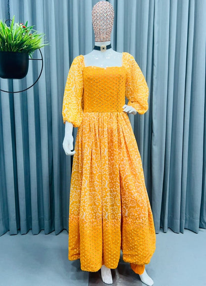 Orange georgette print and embroidery work gown