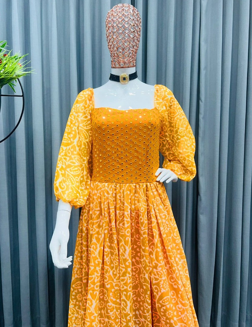 Orange georgette print and embroidery work gown