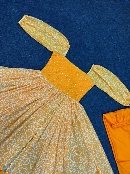 Orange georgette print and embroidery work gown