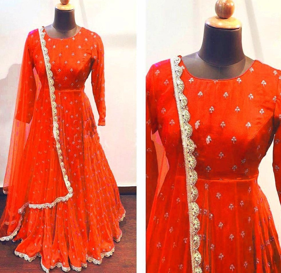 Orange heavy georgette with embroidered work party wear gown