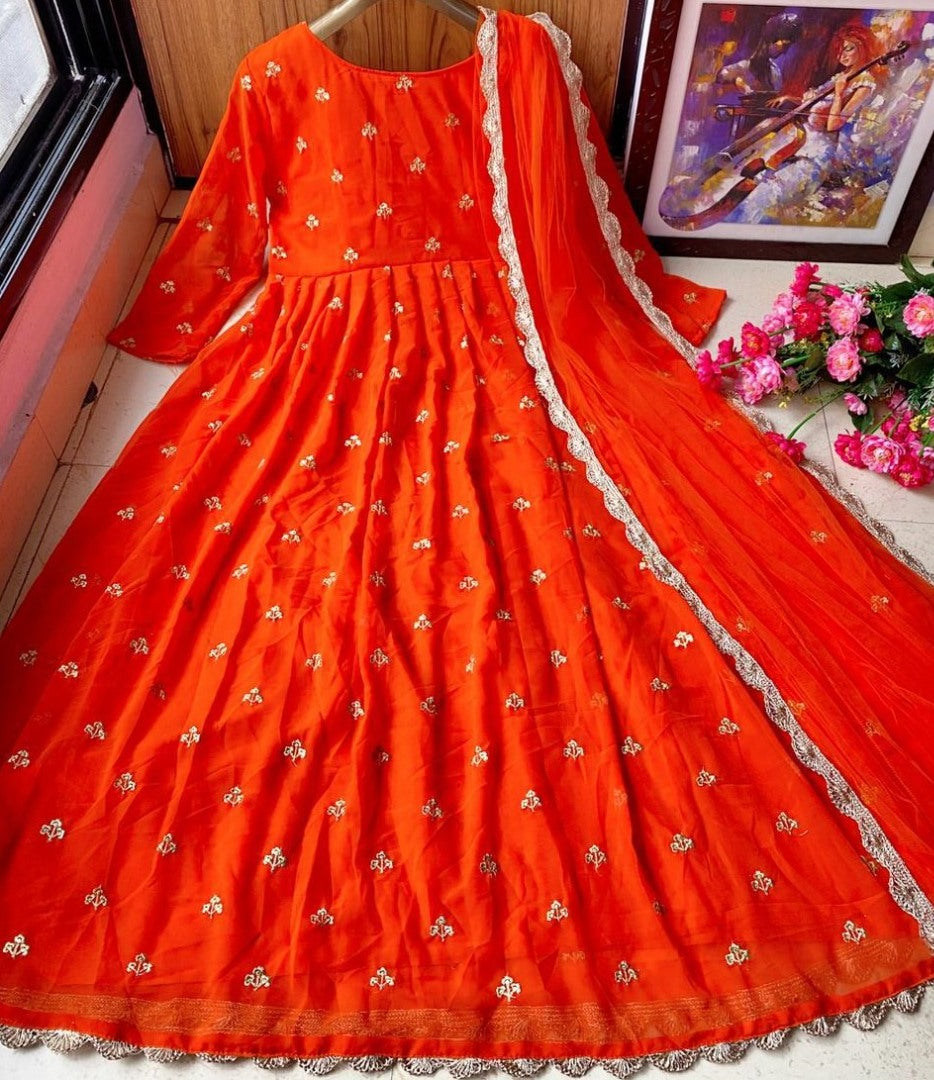 Orange heavy georgette with embroidered work party wear gown