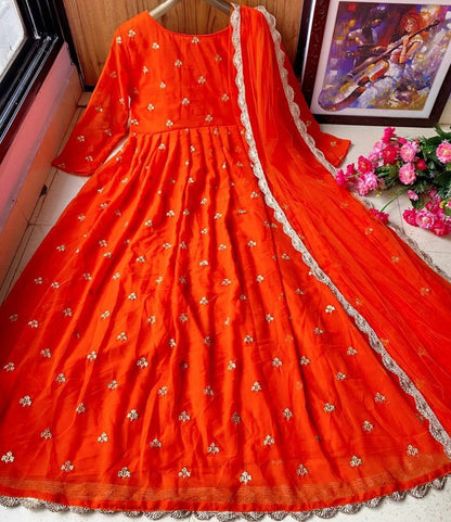 Orange heavy georgette with embroidered work party wear gown