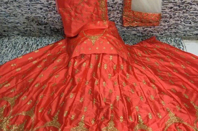 Orange malai satin heavy embroidered ceremonial lehenga choli