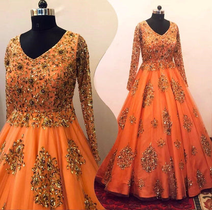 Orange net heavy sequence work wedding gown