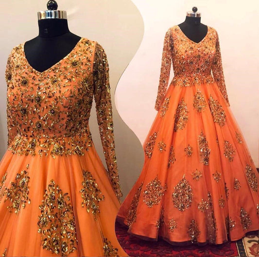 Orange net heavy sequence work wedding gown