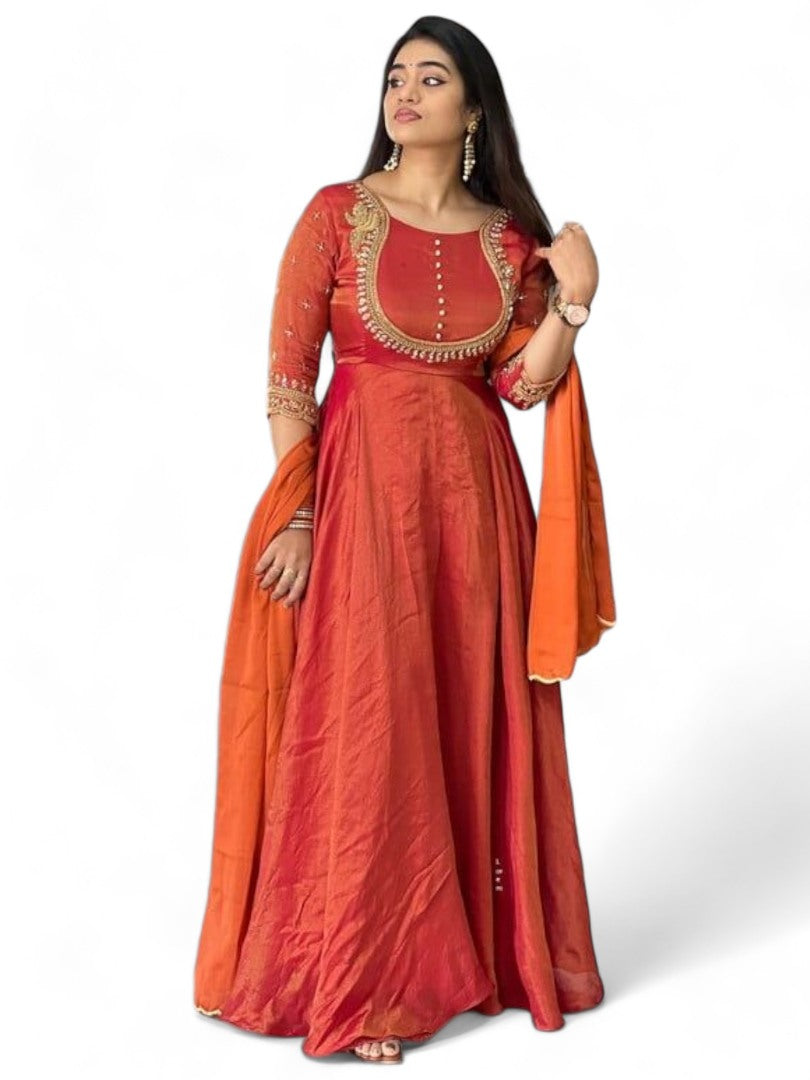 Orange party wear silk gown