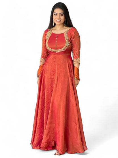 Orange party wear silk gown