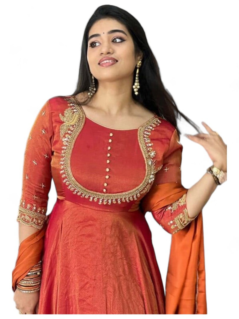 Orange party wear silk gown