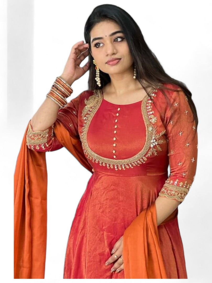 Orange party wear silk gown