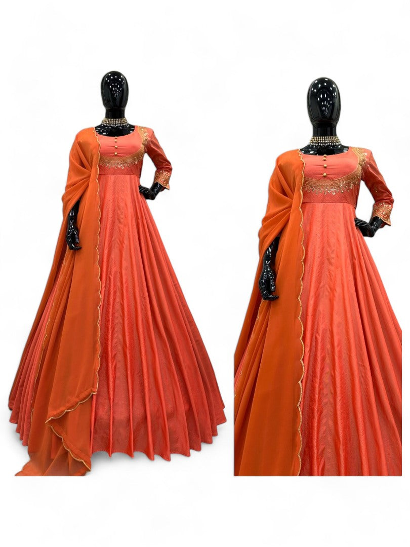 Orange party wear silk gown