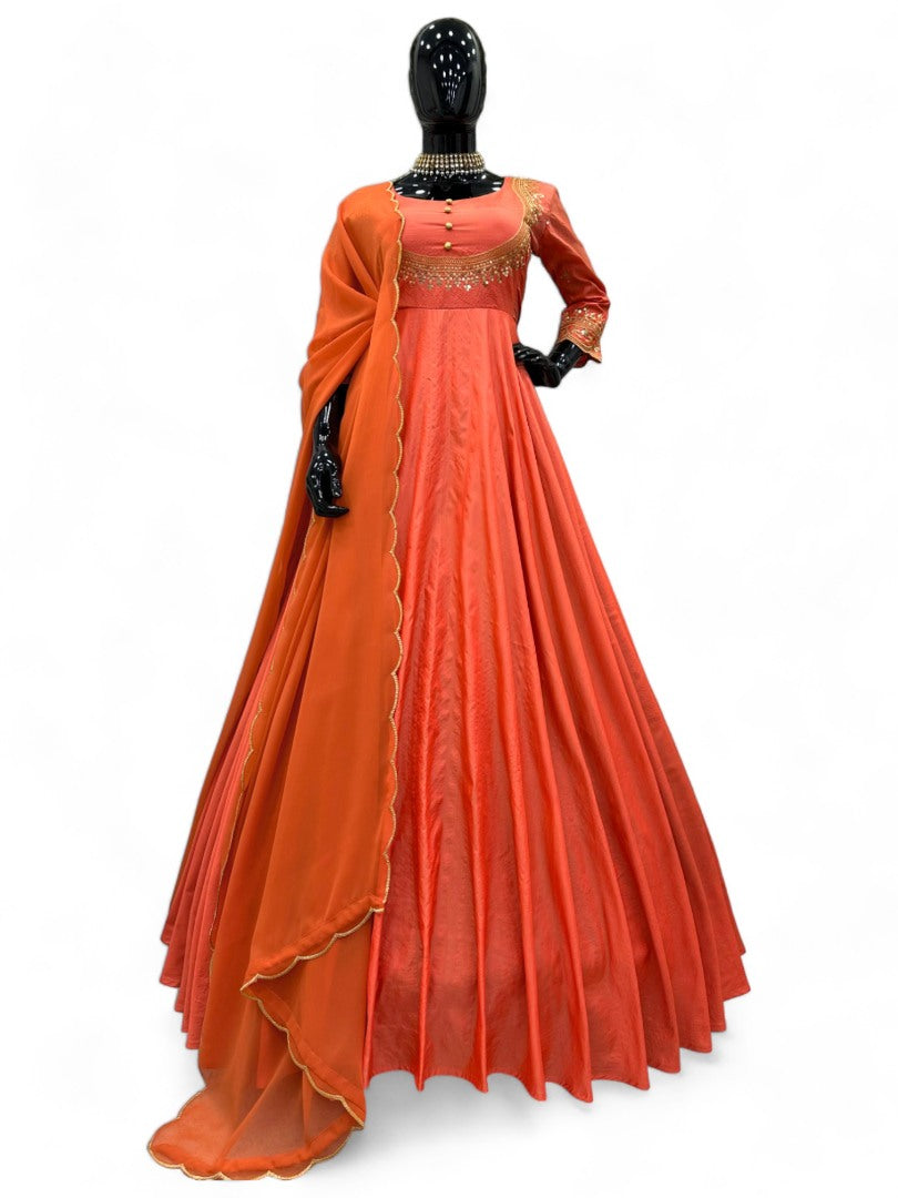 Orange party wear silk gown