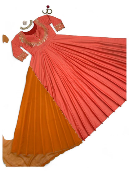 Orange party wear silk gown