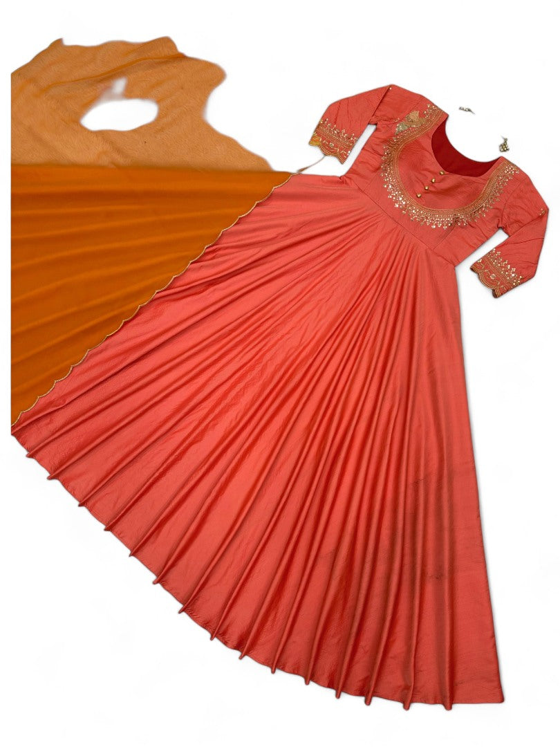Orange party wear silk gown