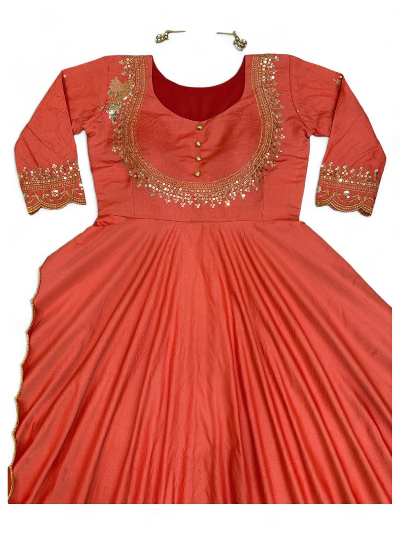 Orange party wear silk gown