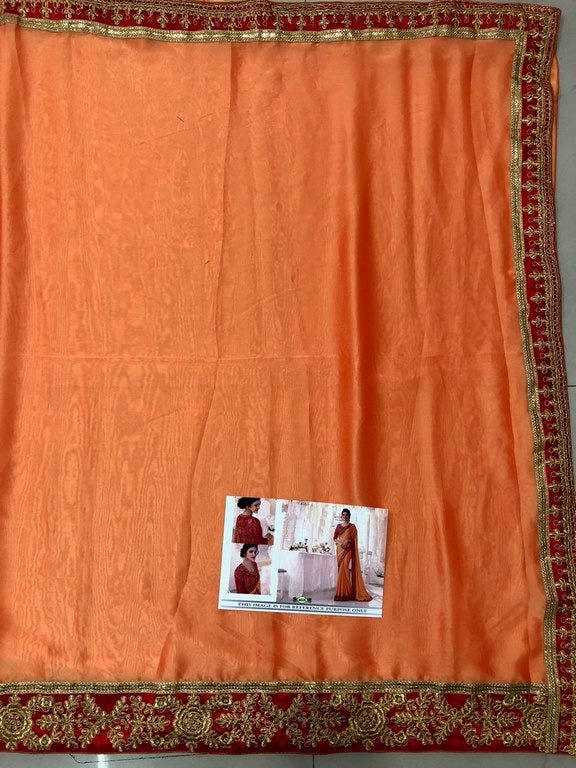 orange partywear embroidered georgette silk saree
