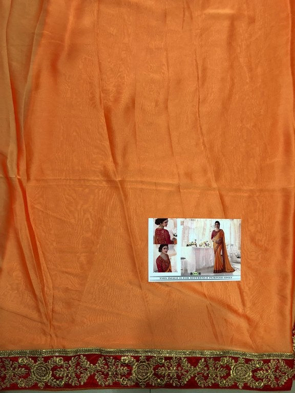 orange partywear embroidered georgette silk saree