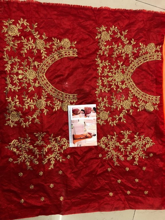 orange partywear embroidered georgette silk saree