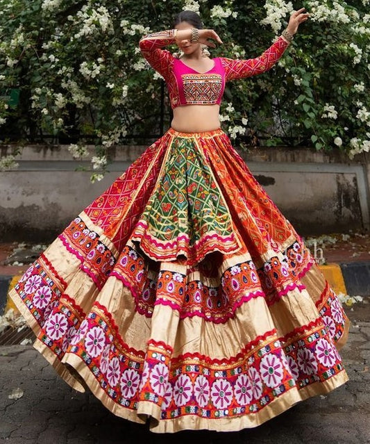 Orange pink print and mirror work gujarati garba navratri lehenga chaniya choli