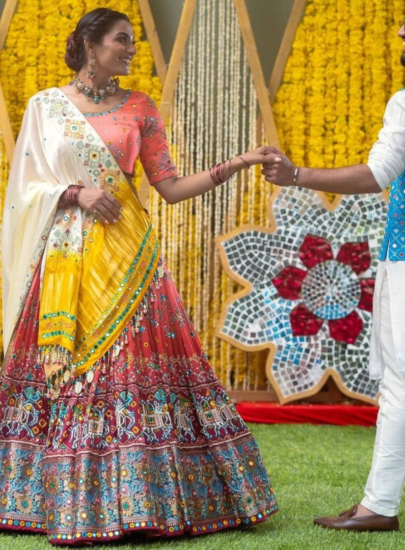 Orange print and mirror work gujarati garba navratri lehenga chaniya choli