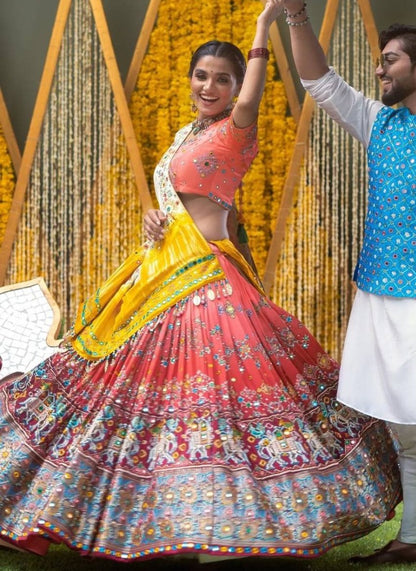 Orange print and mirror work gujarati garba navratri lehenga chaniya choli