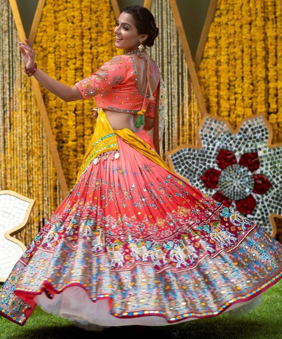 Orange print and mirror work gujarati garba navratri lehenga chaniya choli