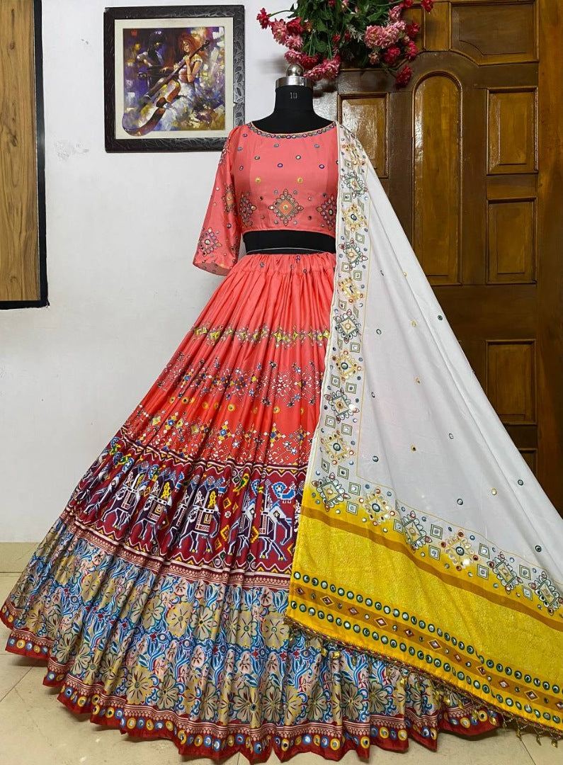 Orange print and mirror work gujarati garba navratri lehenga chaniya choli