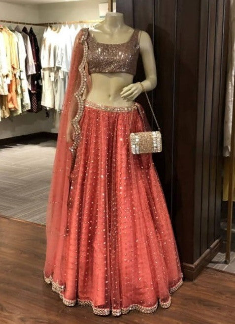 Orange soft net embroidered wedding lehenga choli