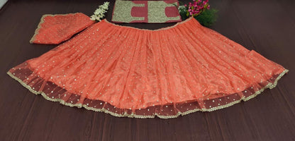 Orange soft net embroidered wedding lehenga choli