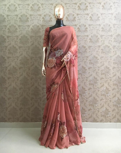 Peach floral printed pearl border saree